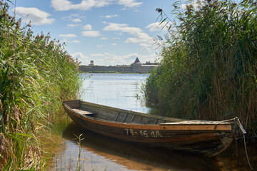 A boat near the river bank