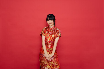 Asian woman wear Chinese dress with action