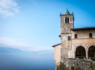 Fototapeta na wymiar popular and famous place of Lake Maggiore Eremo di Santa Caterina del Sasso, Lombardy, Italy.