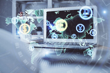 Financial graph colorful drawing and table with computer on background. Double exposure. Concept of...