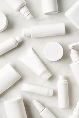 Bunch of assorted skin care products on table