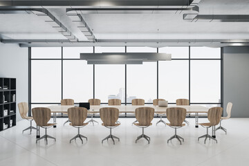 Clean conference interior with large meeting table