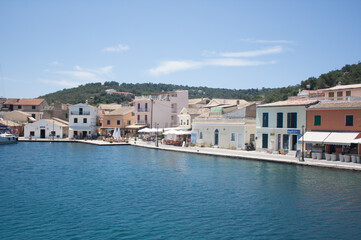 Fototapeta premium View of a cozy Greek village from the sea