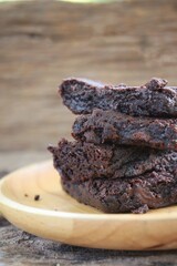 Chocolate brownies cake on wood background