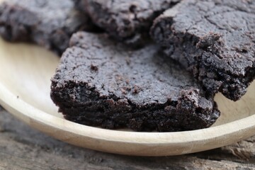 Chocolate brownies cake on wood background