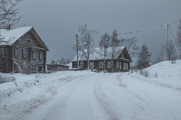 Small old village in the Russian north. Winter morning in the village.