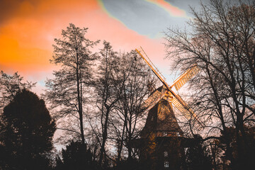 a beautiful old windmill in autumn
