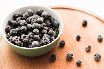 Frozen frozen berry black Rowan Frozen fruit. Top view, flat lay, close up.