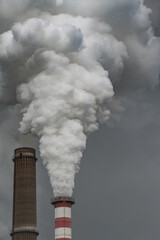 Fototapeta na wymiar pollution, furnace inside a chemical plant, brown and white coal power plant emission.