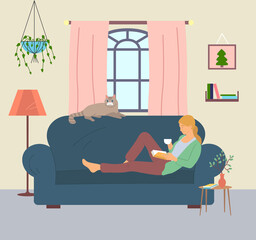 Happy young woman with ponytail lying on sofa in living room at home and relaxing. Female drinking tea or coffee and reading book. Cute funny cat lying near woman. Recreation, leisure time, hobby