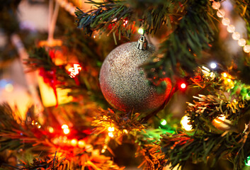 Silver ball and colorful lights on Christmas tree