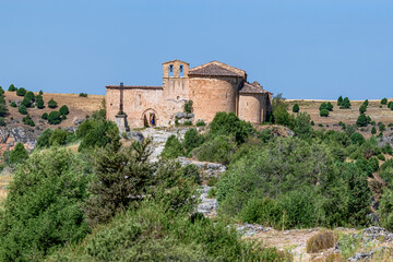 Fototapeta premium Front view of the Ermita de San Frutos, an old sanctuary, in the middle of the natural park. Photograph taken in Burgomillodo, Segovia, Spain.