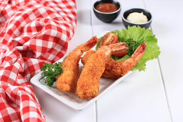 Tempura Shrimp/Prawn, Japanese Traditional Cuisine made from Deep Fried Shrimp  Coated with Bread Crumb or Panko, Usually Find as Bento Lunch Menu. On White Wooden Background