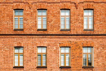 Beautiful vintage red brick building at sunny day