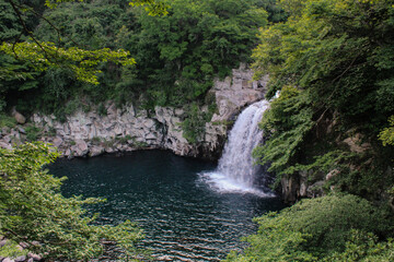 Beautiful waterfall view in national park. Tropical hiking