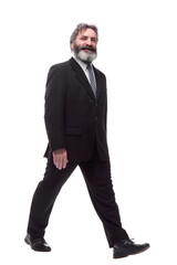 cheerful bearded man striding forward. isolated on a white