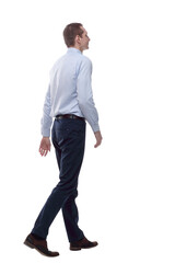 confident business man stepping forward . isolated on a white