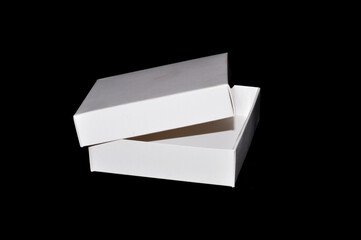 paper box isolated on black background