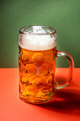 beer mug on green and red background, christmas