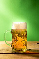 beer mug on green background