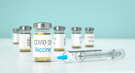 Vaccine for Covid-19 in close up. Medication for coronavirus in bottles. Treatment for coronavirus made in lab...