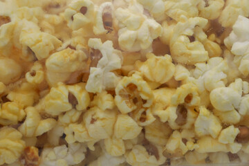 Sweet-flavored popcorn coming out of the oven hot and delicious.
