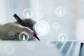 Fototapeta premium Social network media concept with hand writing in diary on background with laptop. Double exposure