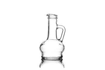 Empty glass bowl for oil or vinegar on white background, isolate