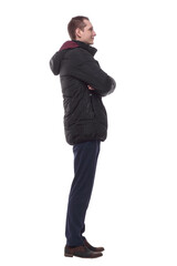 confident young man looking at the white screen . isolated on a white