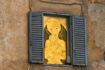 Darstellung von Maria mit dem Jesuskind in den Straßen von Florenz, Italien