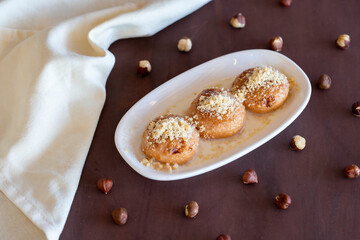 Turkish Kemalpasa Cheese Dessert / Lor Tatlisi with Pistachio Powder and Sherbet. Traditional...