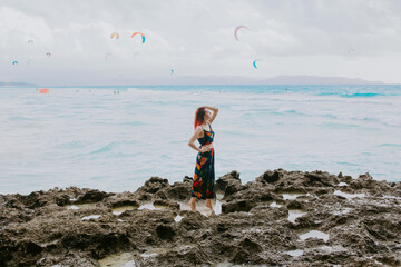 women on the beach in the tropics, in the Philippines