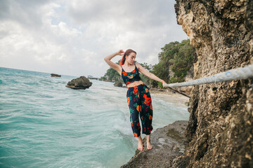 women on the beach in the tropics, in the Philippines