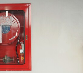 A fire cabinets suite on the wall of the building.