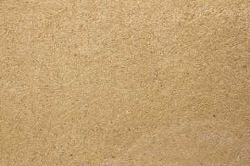 Texture or background wall ocher adobe (mud mixed with straw baked in the sun) 