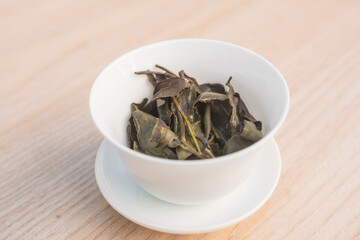 Rare high grade white tea leaves in a gaiwan after a Gong Fu Cha session, asian brewing way. Beautiful full leaves processed by one of the best tea master.