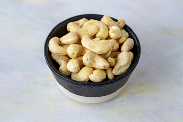 cashew on wooden background - kaju