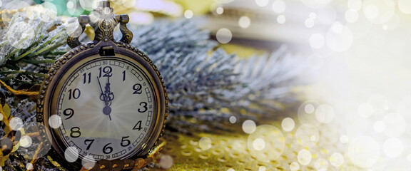 Christmas banner with vintage gold 
pocket watch showing midnight, new year's eve, background color...