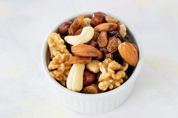 mixed nuts in bowl - on white background