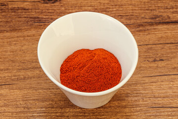 Dry paprika powder in the bowl