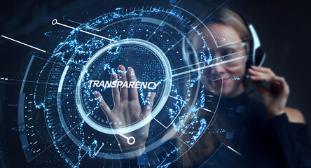 Business, Technology, Internet and network concept. Young businessman working on a virtual screen of the future and sees the inscription: Transparency