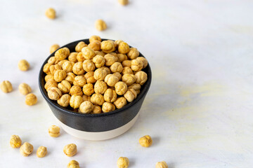Hazelnuts in plate isolated on white background - copy space