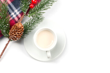 Christmas composition. Christmas gifts, fir branches, and a coffee mug on a white background. Flat lay, top view, copy space.