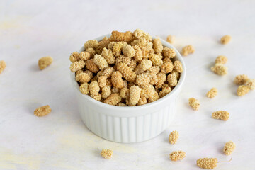 dried mulberry on wooden background - kuru dut