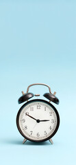 Analog clock on blue background