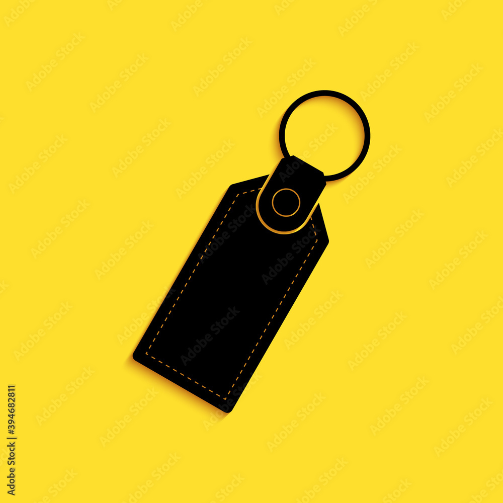 Poster black rectangular key chain with ring for key icon isolated on yellow background. long shadow style.
