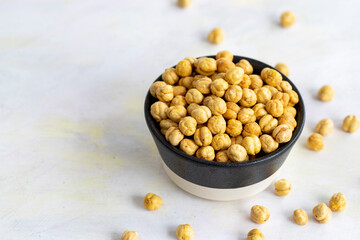 Hazelnuts in plate isolated on white background - copy space