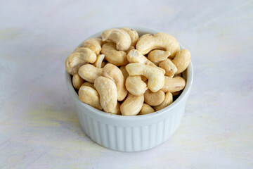 cashew on wooden background - kaju