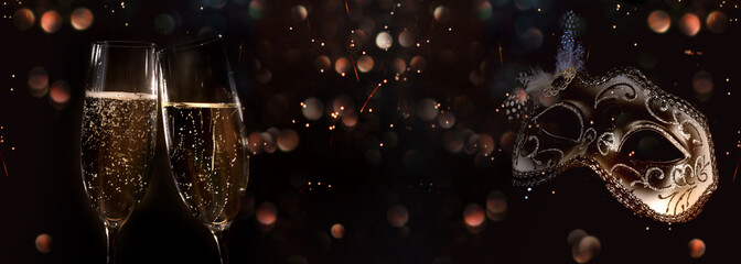 Champagne for carnival and new year greetings. Abstract dark bokeh background with champagne...