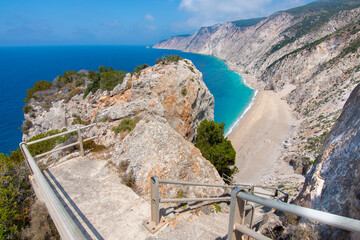 Platia Ammos, secluded beach in Lixouri, Kefalonia, Greece. The staircase leading to the beach